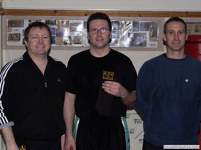 Simon Hugill receiving his Brown Sash