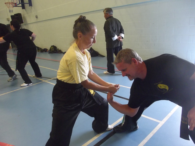 Guardian Morag Quirk putting Warrick Bowler in a lock at the Summer Course