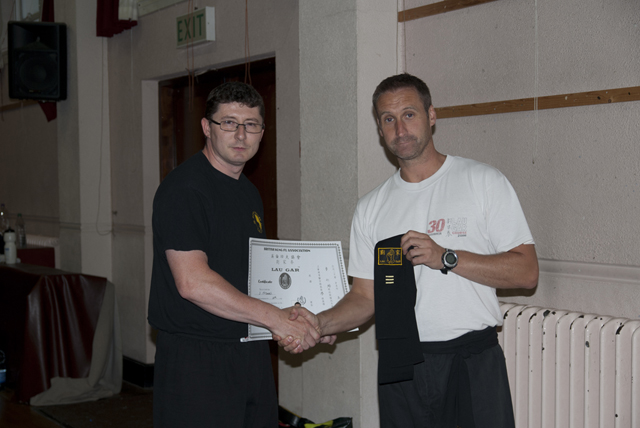 Stephen receiving his Third Degree Black Sash from Sifu Derek Dawson