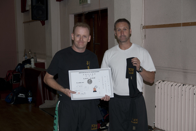 John receiving his Third Degree Black Sash from Sifu Derek Dawson