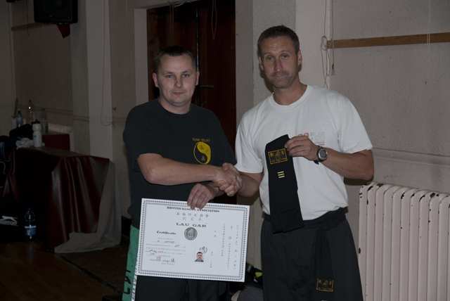 Ian receiving his Third Degree Black Sash from Sifu Derek Dawson